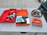 All tools and toolbox laid out on table