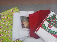 Group shot showing all five folded tablecloths