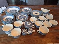 Full set laid out on table showing quantity and variety of pieces