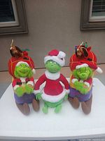 Front view of all three plush items