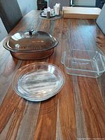 Group shot of casserole, baking dish, pie plate, marble trivet
