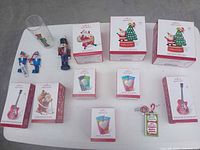 Full lot showing boxed ornaments, nutcrackers, glass tumbler and tag ornament