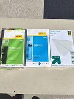 Three reams of legal size paper: OfficeMax multipurpose, OfficeMax copy, up&up printer