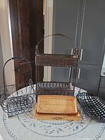 Group shot of all baskets, trays and tiered stand