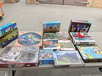 Group shot of all sealed puzzle boxes on table