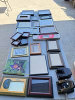 Overhead view of entire lot laid out on table showing all frames and hole punches