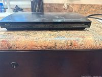 Front view of Sony Blu-ray/DVD player on countertop
