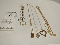 Group shot of rings, necklaces and earrings