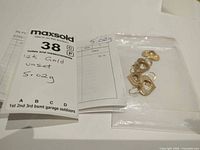 Lot overview with MaxSold tag showing weight and material