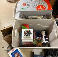 Top view of two totes with assorted decorations visible