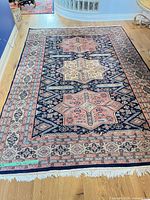 Full view of the oriental rug showing overall pattern and size