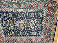 Full rug showing pattern, colors, overall condition
