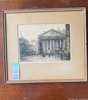 Full view of framed etching showing image, mat and frame