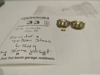Both rings with loose citrine stone and weight/metal note visible