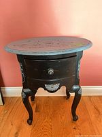 Full view of painted wood side table