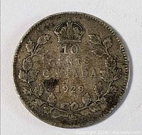 Reverse: crown, denomination, date, wreath visible