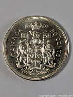 Reverse of 1959 Canada 50-cent coin showing Royal Arms and year