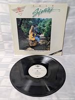 Vinyl record with front sleeve