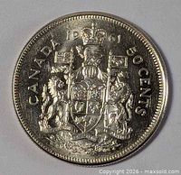 Reverse of 1961 Canadian 50-cent coin showing coat of arms and denomination