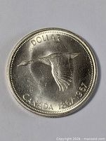 Reverse showing flying Canada goose and dates 1867-1967