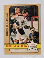 Front of 1972-73 O-Pee-Chee Bobby Orr card showing action photo, text, subset star