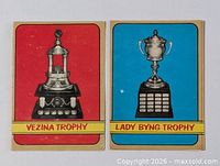 Front view of both trophy cards side by side