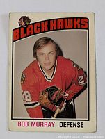 Front of card displaying player image and team name