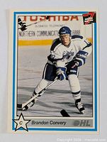 Front of Brandon Convery OHL card showing action photo, blue border, logo
