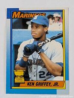Front view of Ken Griffey Jr. card showing image, Mariners logo, Topps All-Star Rookie cup, card number location