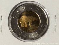 Reverse view showing polar bear design and CANADA 2 DOLLARS legend