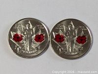 Front view of both 2010 colourized poppy quarters