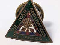 Front view showing triangular enamel design and text