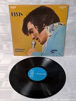 Front cover with vinyl record displayed