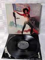 Record on top of inner sleeve with front jacket displayed