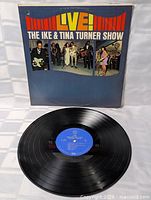 Front sleeve with album title and performance photos