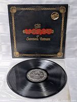 Front cover with vinyl record displayed