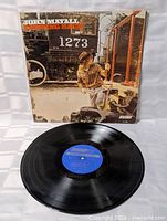 Front sleeve and vinyl record showing blue London label
