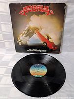 Front sleeve and vinyl record displayed