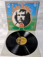 Front cover and vinyl record showing label