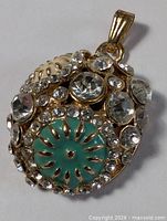 front view showing rhinestones and cabochons