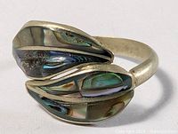 Top view of abalone inlay twin-leaf sterling alpaca ring