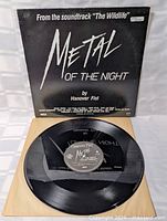 Front sleeve and record showing title and label