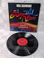 Front cover and vinyl record displayed