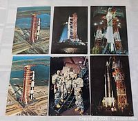 All six NASA postcards laid out