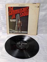 Front cover and vinyl disc displayed