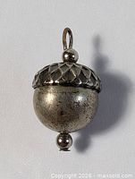 Front view of sterling silver acorn pendant