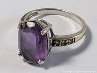 Full view of ring showing amethyst and setting