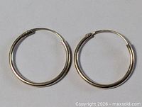 Full view of both sterling silver hoop earrings