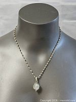 Full view of sterling silver necklace on bust