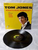 Front sleeve and vinyl record showing label and catalog number